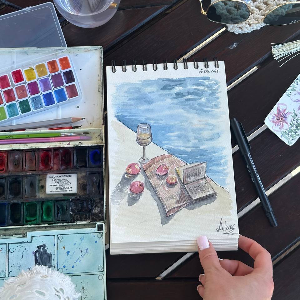 Valentyna painting in the studio